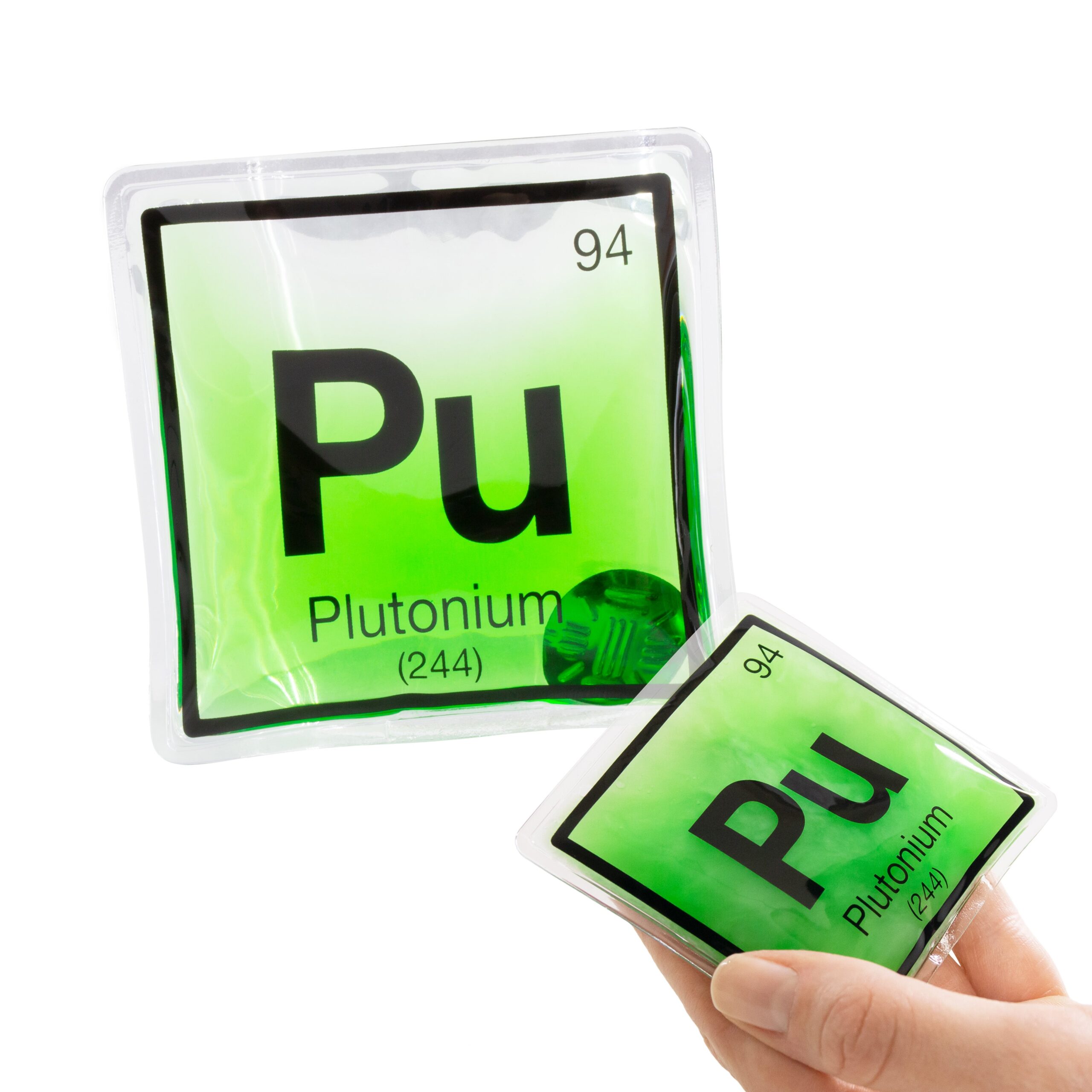 Grüner Handwärmer mit dem Elementsymbol Pu, groß und in einer Hand gezeigt